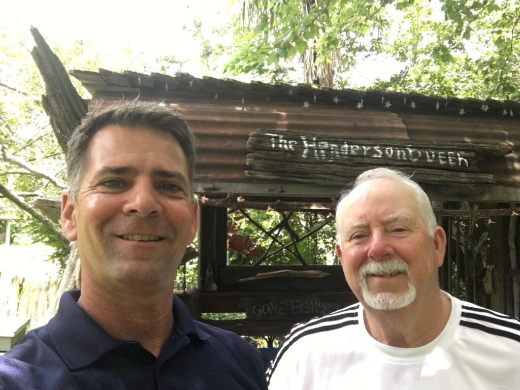 Richard Broussard with a raving fan of Roofing Louisiana